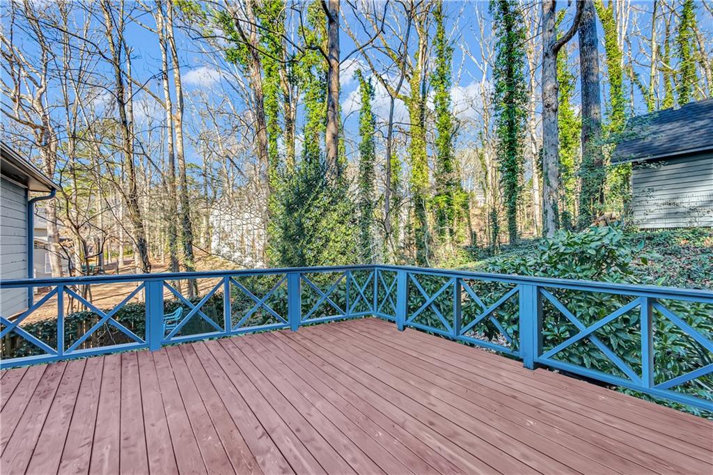2894 McPherson Road Northeast Roswell, GA 30075 - Photo 24 of 24 a view of balcony with wooden floor and seating space