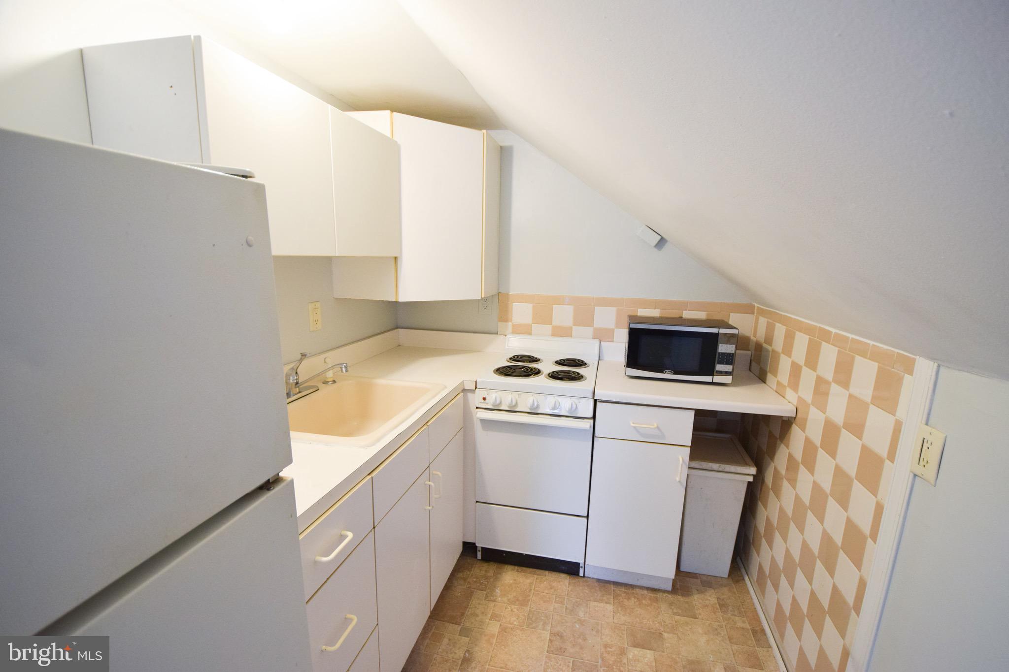 1224 Rustic Avenue Rosedale, MD 21237 - Photo 32 of 41 Garage Loft Kitchen