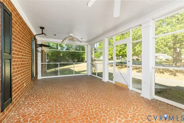 a kitchen with stainless steel appliances granite countertop a sink and a refrigerator