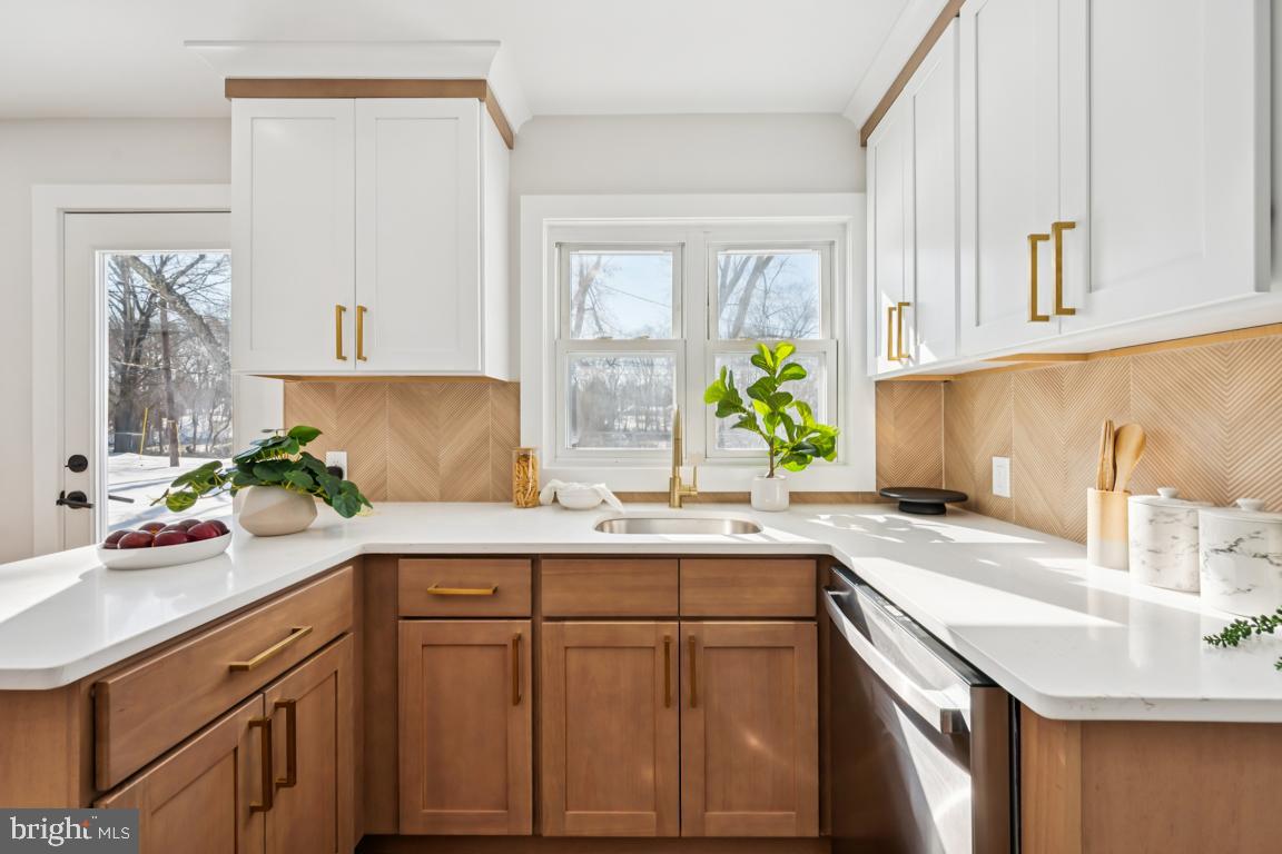 2 Sylvan Lane Willingboro, NJ 08046 - Photo 12 of 26 a kitchen with a sink and cabinets