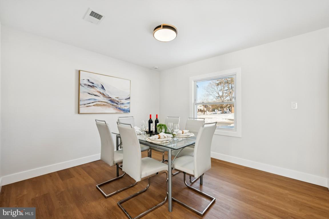 2 Sylvan Lane Willingboro, NJ 08046 - Photo 14 of 26 a dining room with furniture and wooden floor