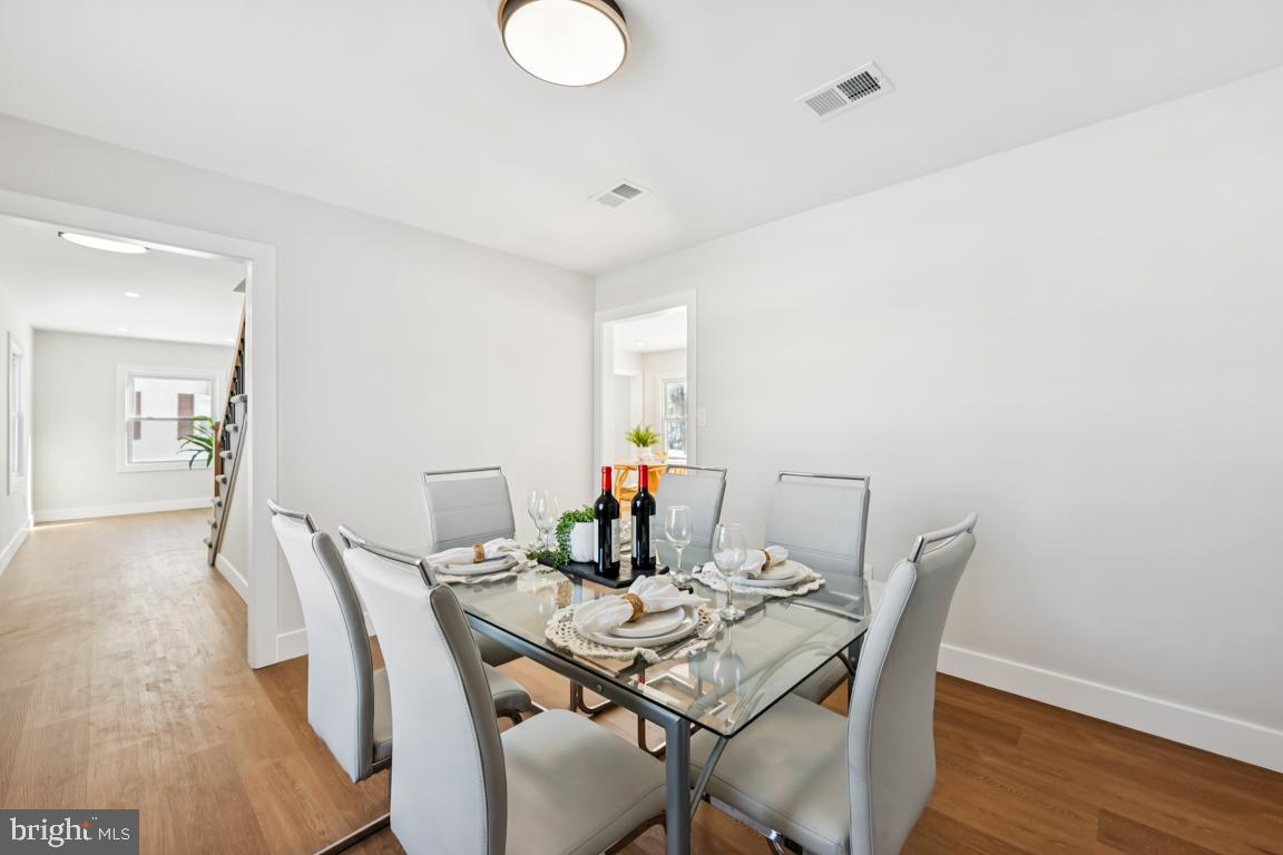 2 Sylvan Lane Willingboro, NJ 08046 - Photo 16 of 26 a view of a dining room with furniture and wooden floor