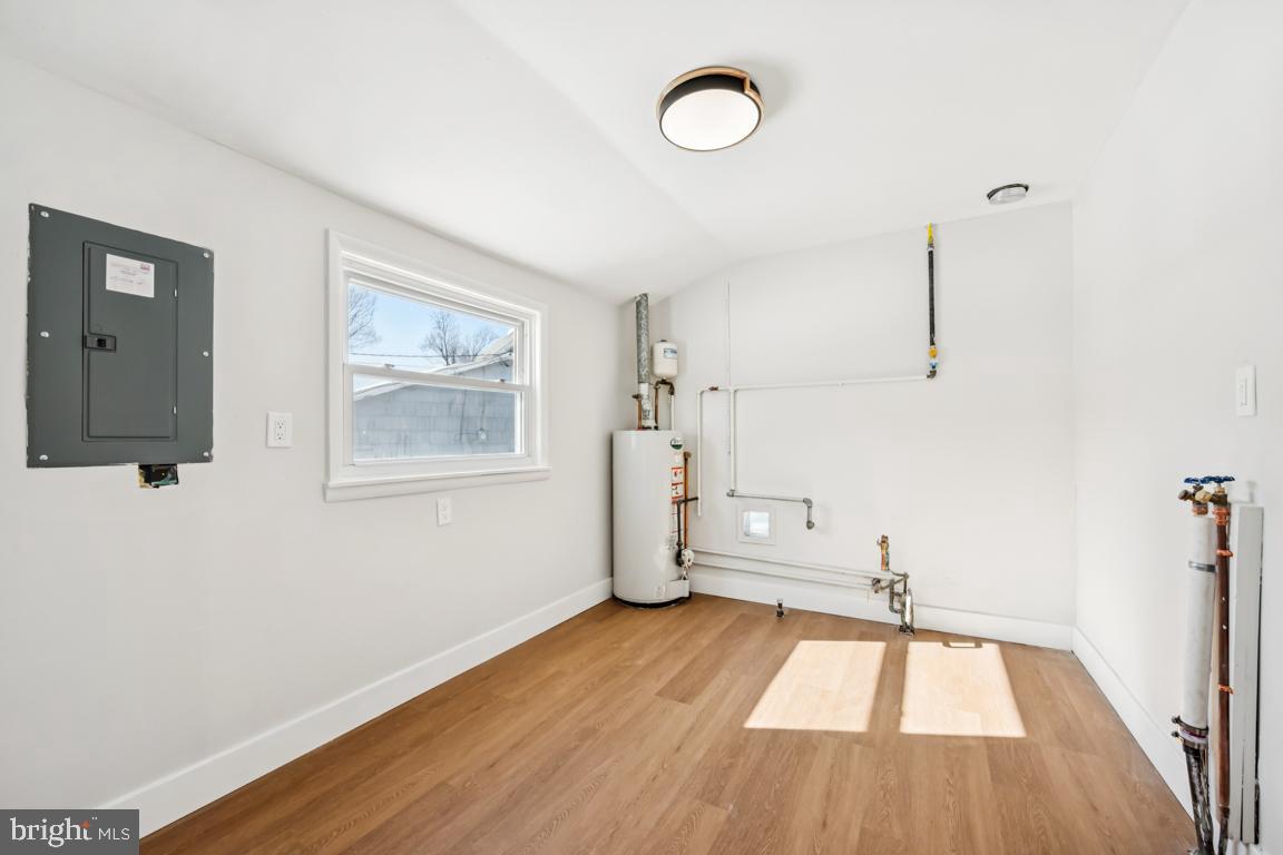 2 Sylvan Lane Willingboro, NJ 08046 - Photo 18 of 26 a view of empty room with wooden floor and fan