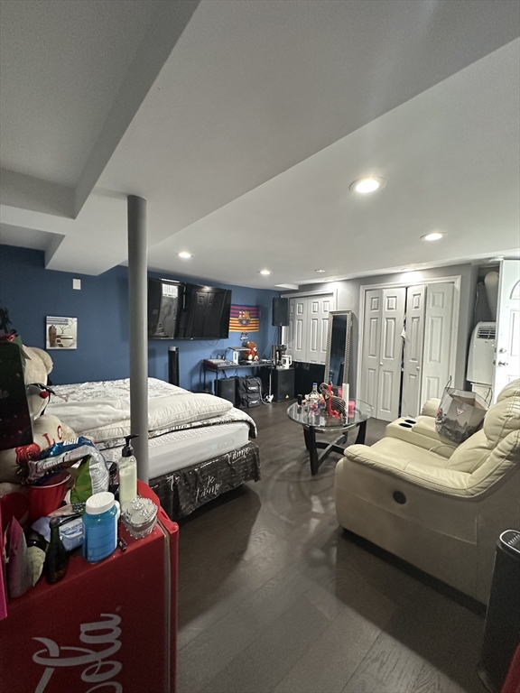 115 Addison Street Chelsea, MA 02150 - Photo 8 of 16 a living room with furniture and a table