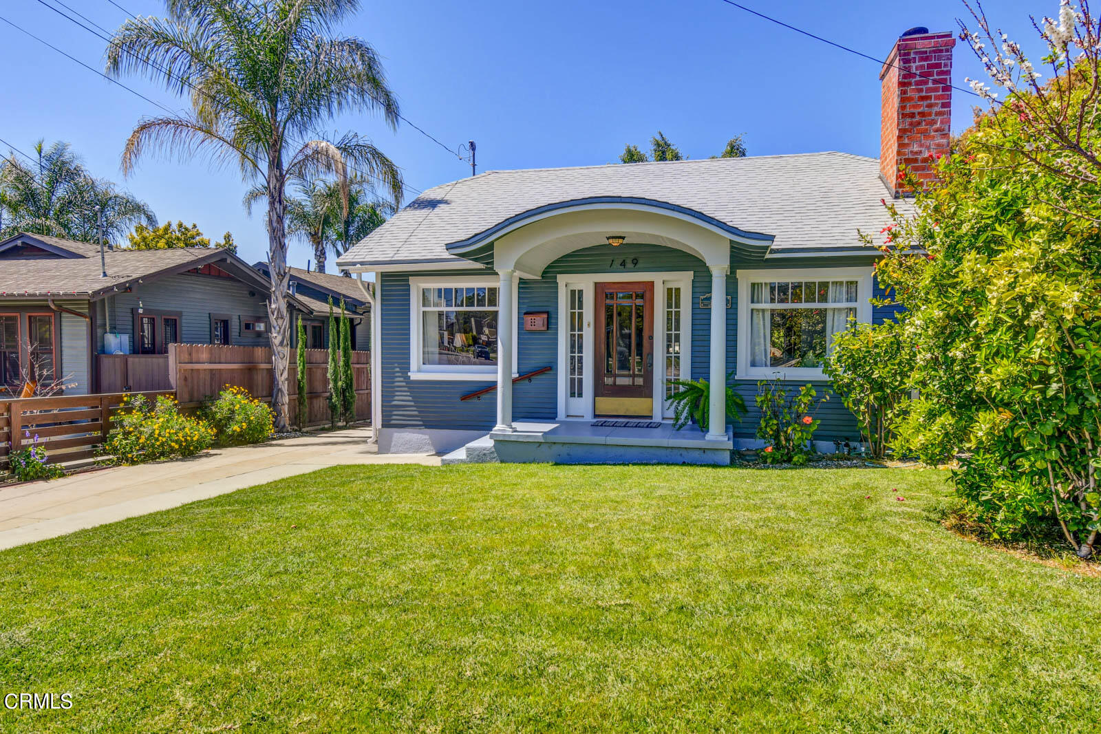 149 Grand Avenue Monrovia, CA 91016 - Photo 2 of 50 a view of a white house with a large pool and windows