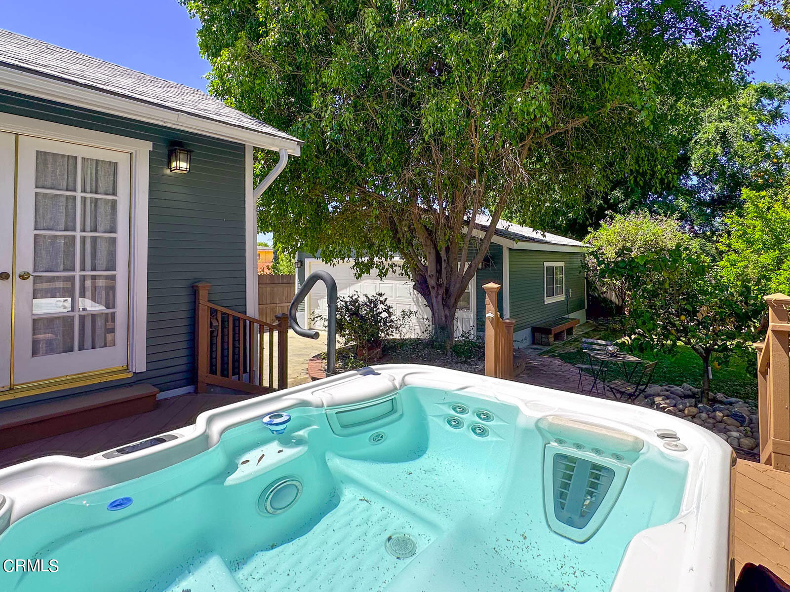 149 Grand Avenue Monrovia, CA 91016 - Photo 28 of 50 a view of a chair and table in backyard of the house
