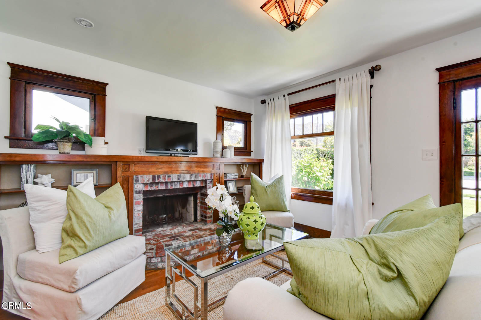 149 Grand Avenue Monrovia, CA 91016 - Photo 3 of 50 a living room with furniture and a fireplace