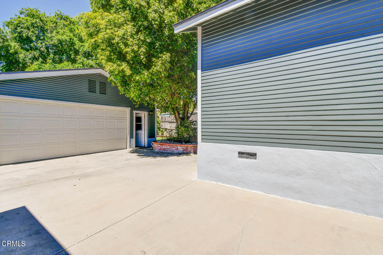 149 Grand Avenue Monrovia, CA 91016 - Photo 34 of 50 a side view of a house with a garage