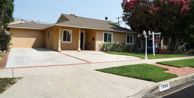 front view of a house with a yard
