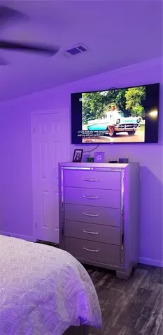 a view of a room with a red gate