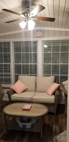 a kitchen with a table and a couch