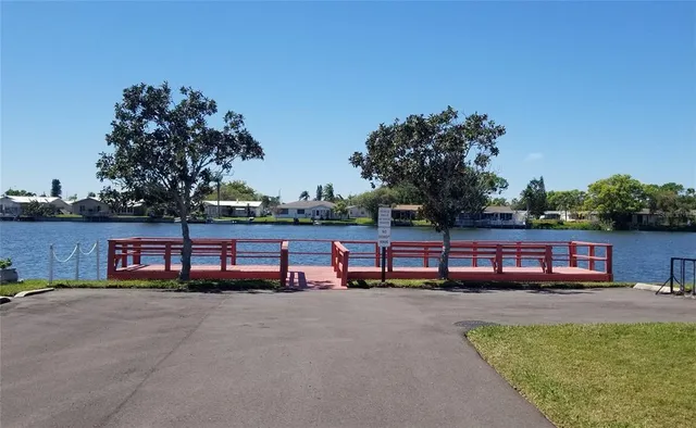 a view of swimming pool with outdoor seating