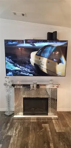 a living room with a fireplace and a stove