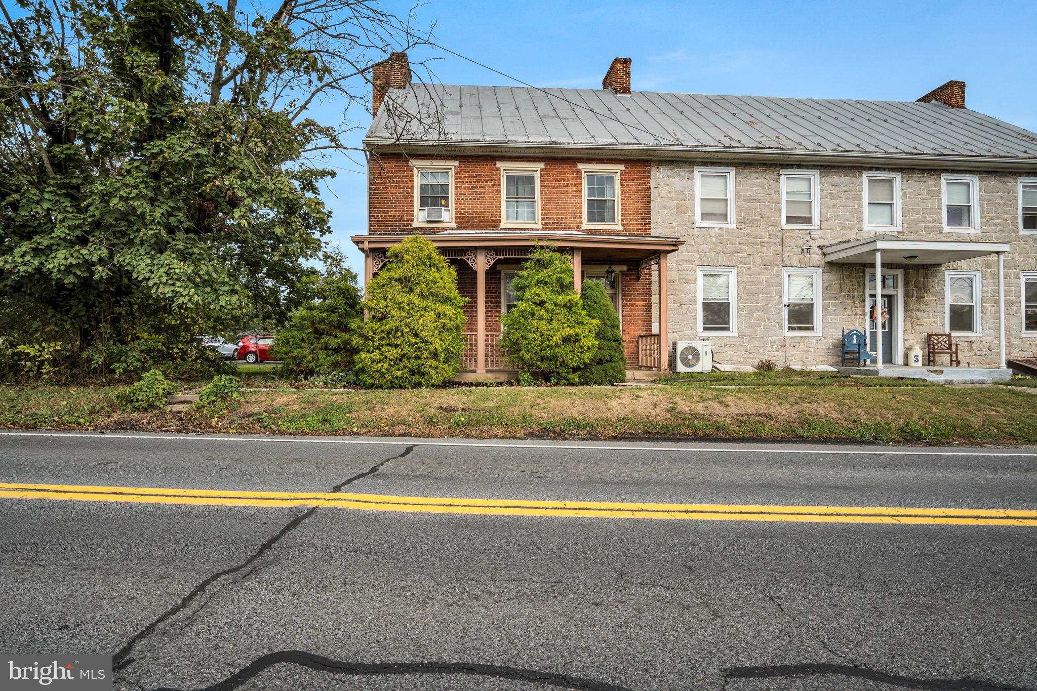 2143 Newville Road Carlisle, PA 17015 - Photo 2 of 40 a view of a house with a swimming pool and a yard