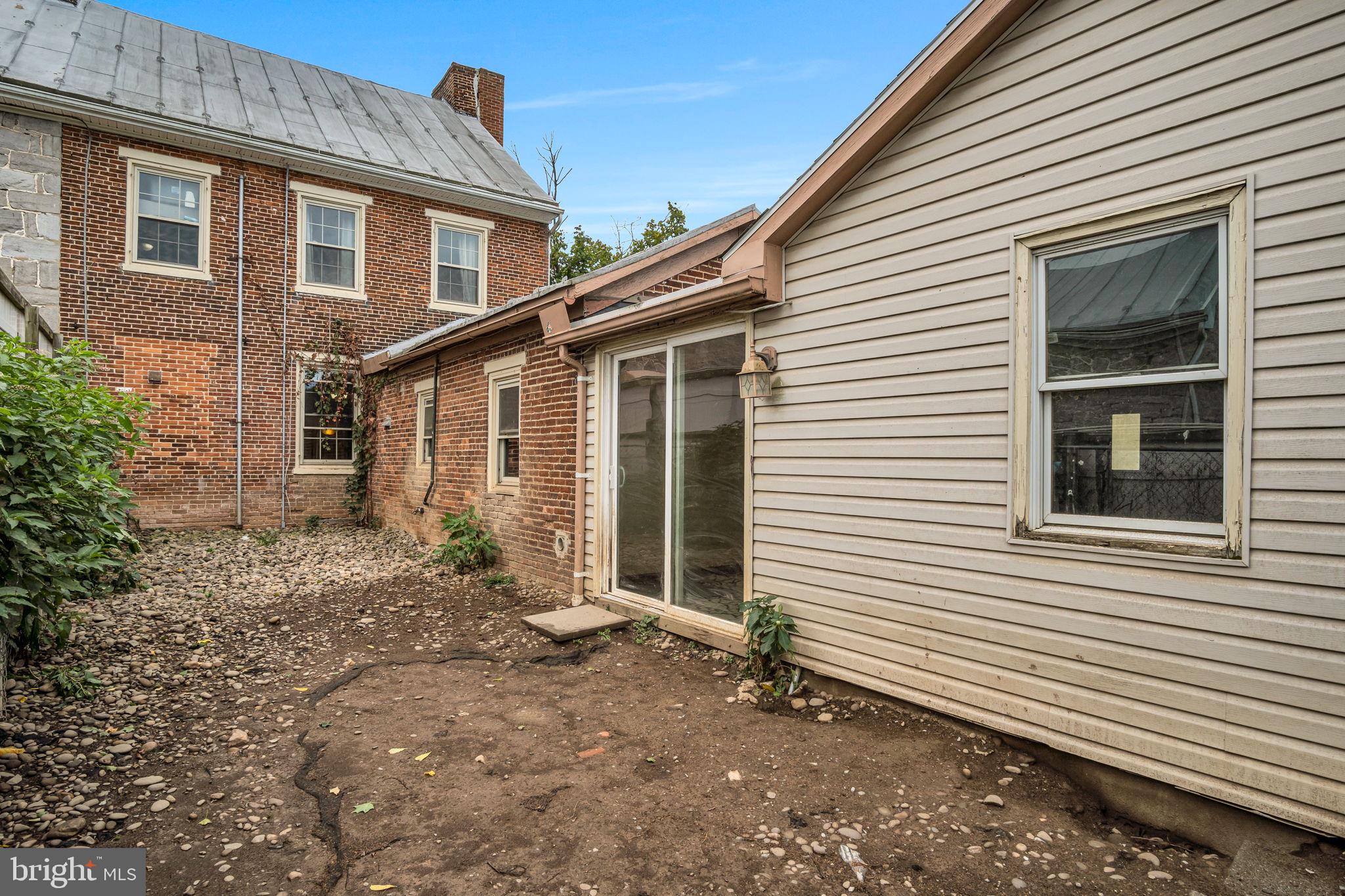 2143 Newville Road Carlisle, PA 17015 - Photo 28 of 40 a front view of a house with a yard