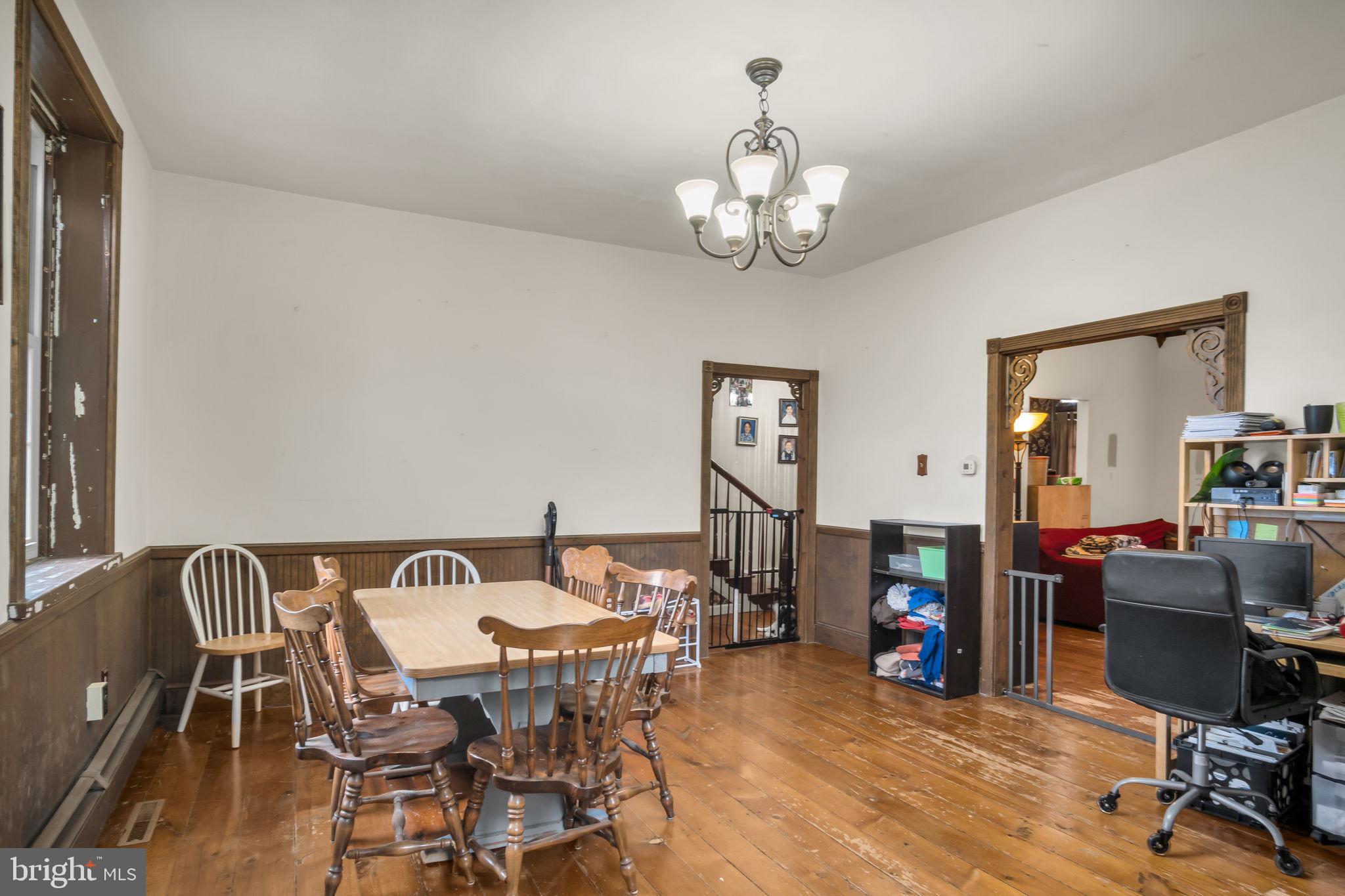 2143 Newville Road Carlisle, PA 17015 - Photo 10 of 40 a view of a dining room with furniture and wooden floor