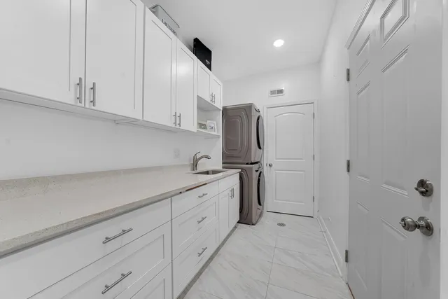 a view of a kitchen with cabinets