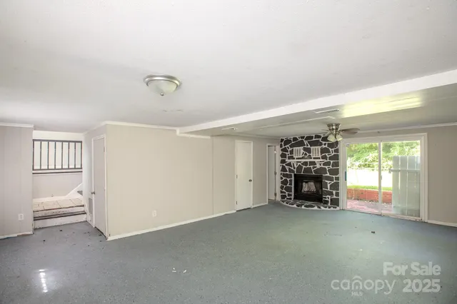 an empty room with windows