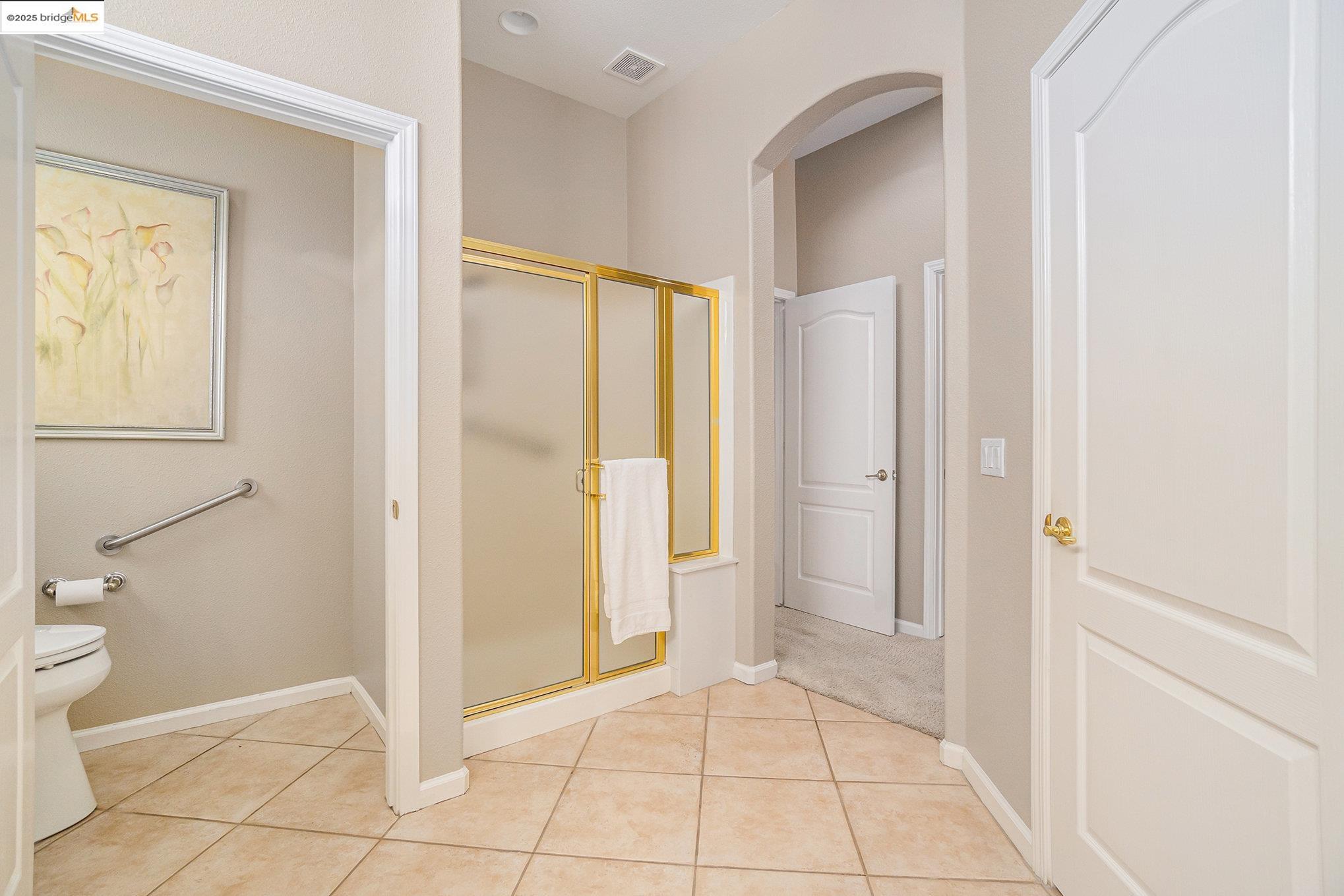 599 Pomona Drive Brentwood, CA 94513 - Photo 12 of 35 Full bath with a shower stall and tile patterned floors