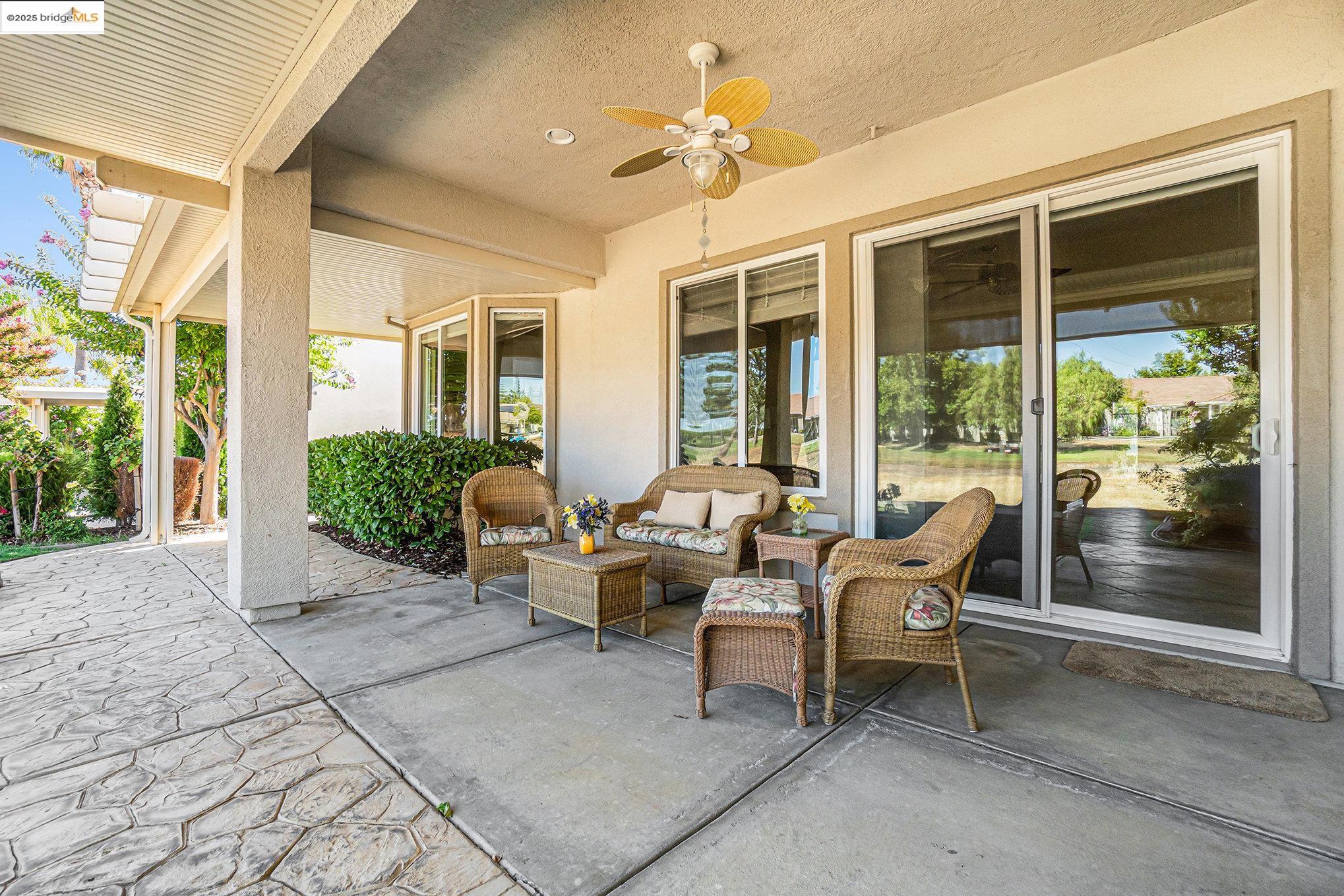 599 Pomona Drive Brentwood, CA 94513 - Photo 23 of 35 View of patio featuring ceiling fan and outdoor lounge area