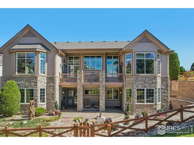 a front view of a house with yard