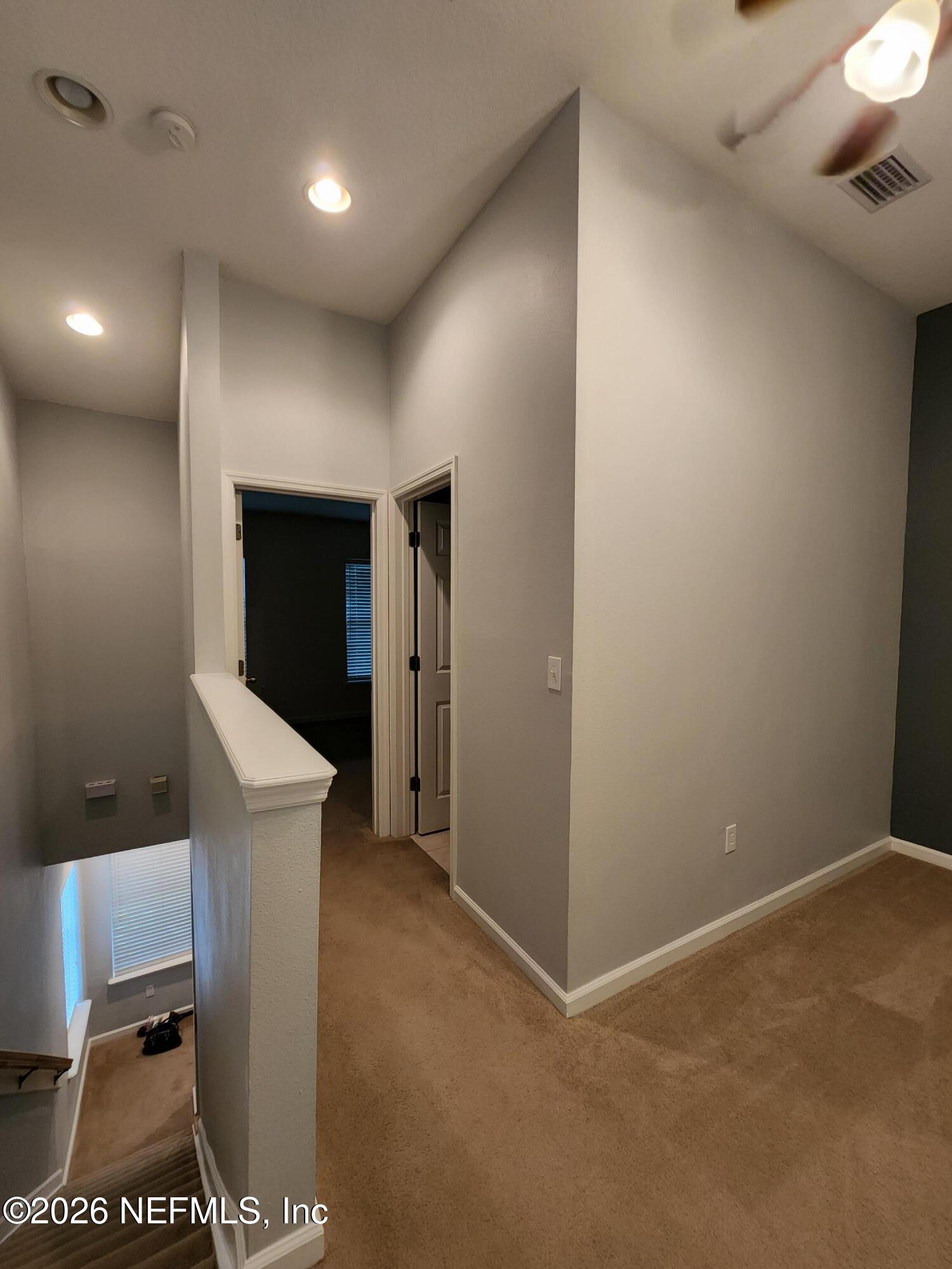 13030 Shallowater Road Jacksonville, FL 32258 - Photo 20 of 27 a view of a hallway with workspace