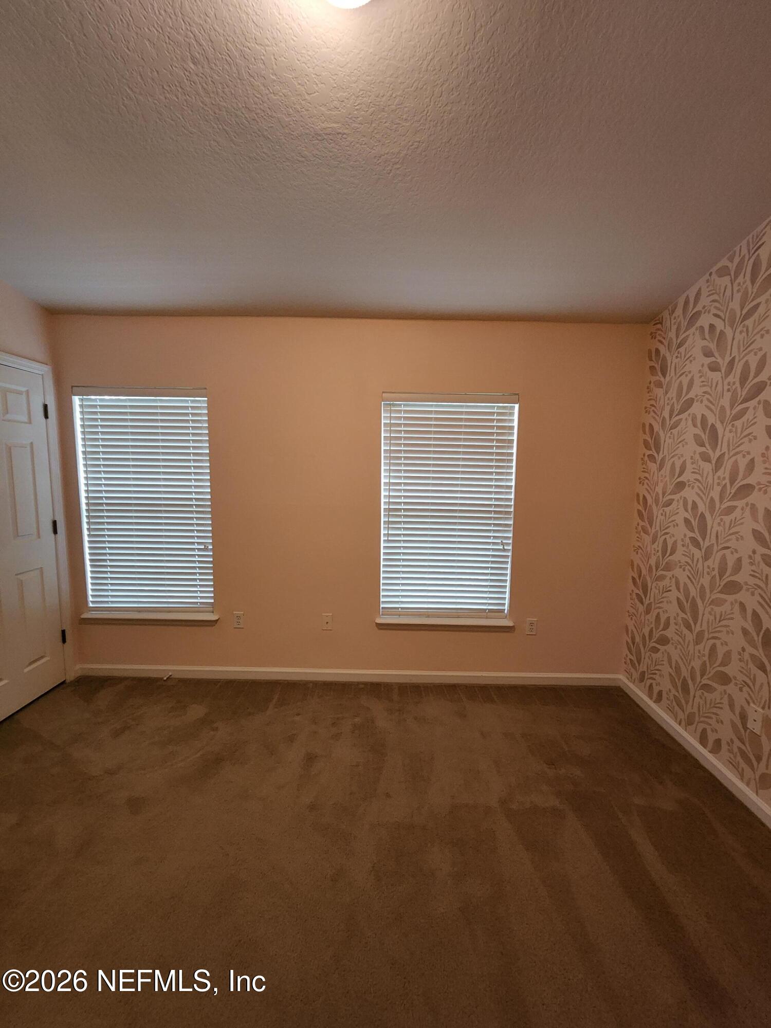 13030 Shallowater Road Jacksonville, FL 32258 - Photo 22 of 27 an empty room with a window
