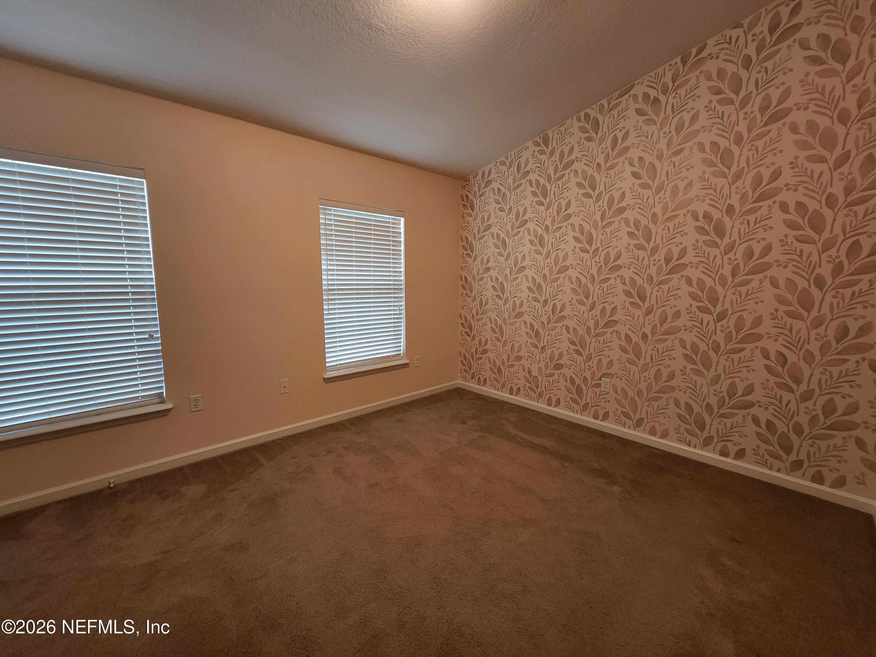 13030 Shallowater Road Jacksonville, FL 32258 - Photo 23 of 27 an empty room with a window