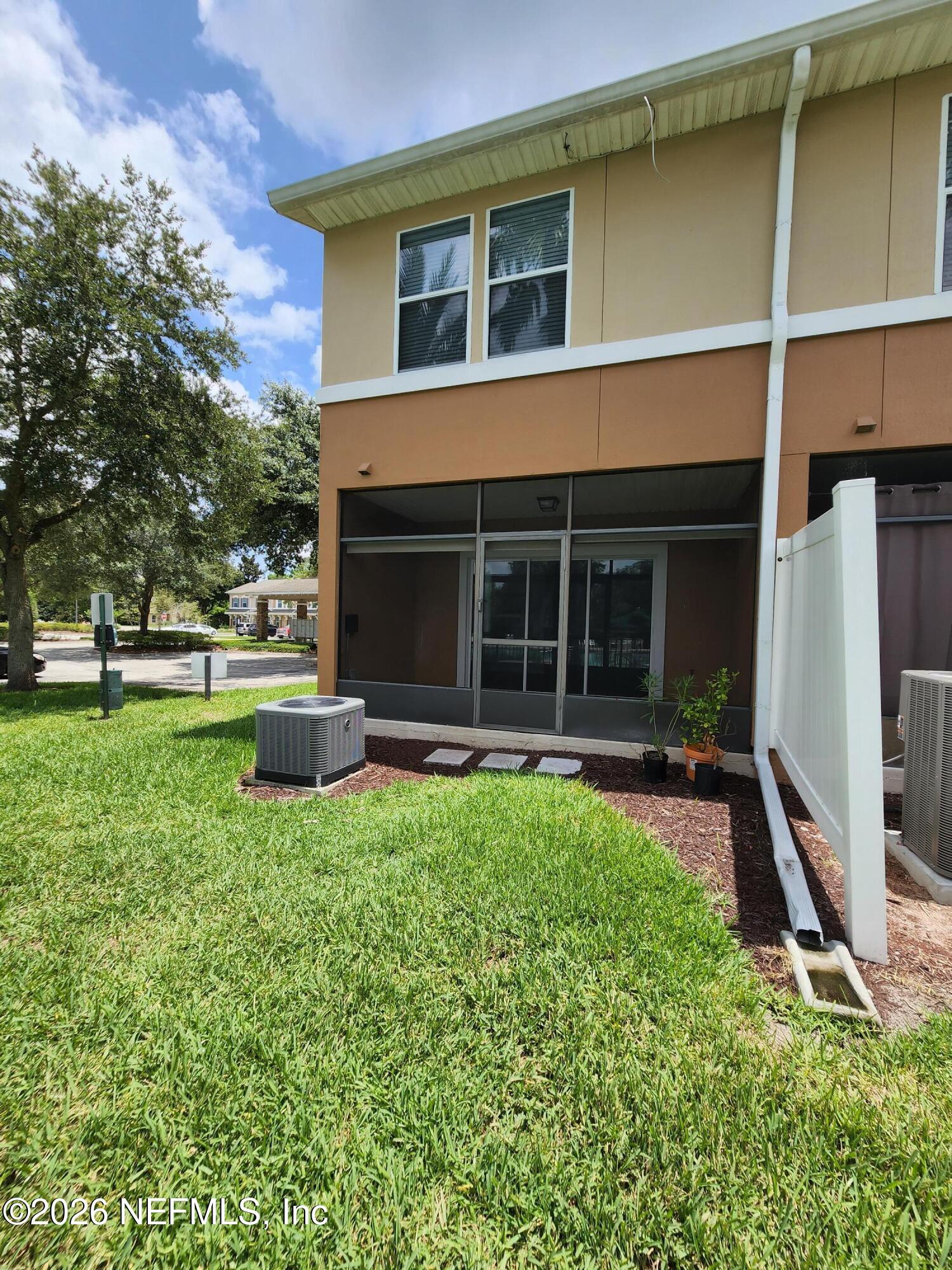 13030 Shallowater Road Jacksonville, FL 32258 - Photo 24 of 27 a view of house with backyard space and garden