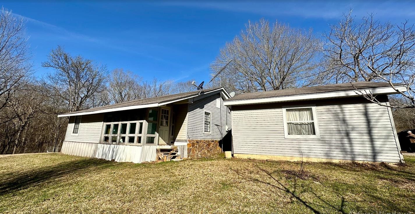 8825 Wolf Pen Road Pocahontas, TN 38061 - Photo 1 of 14 a view of a house with a yard