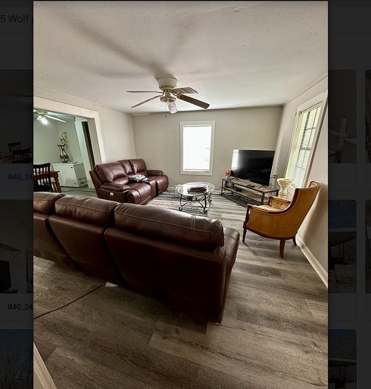 8825 Wolf Pen Road Pocahontas, TN 38061 - Photo 2 of 14 a living room with furniture and a flat screen tv