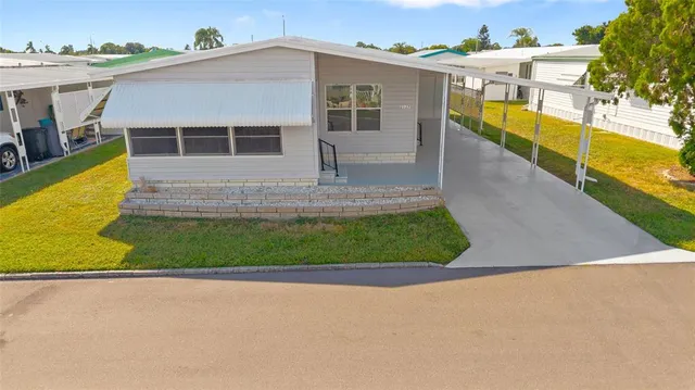 a view of a house with a swimming pool