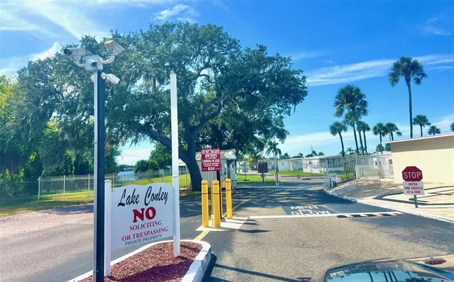 an aerial view of residential house with outdoor space and swimming pool