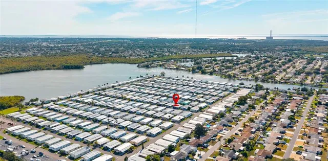 a view of a garden with a small house