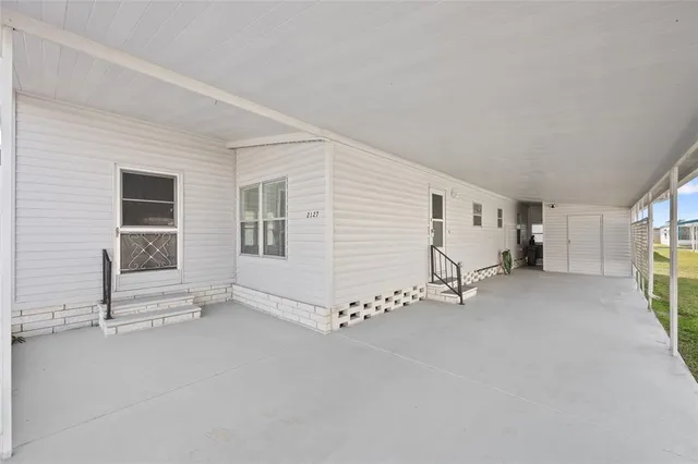 a view of storage and utility room with washer and dryer
