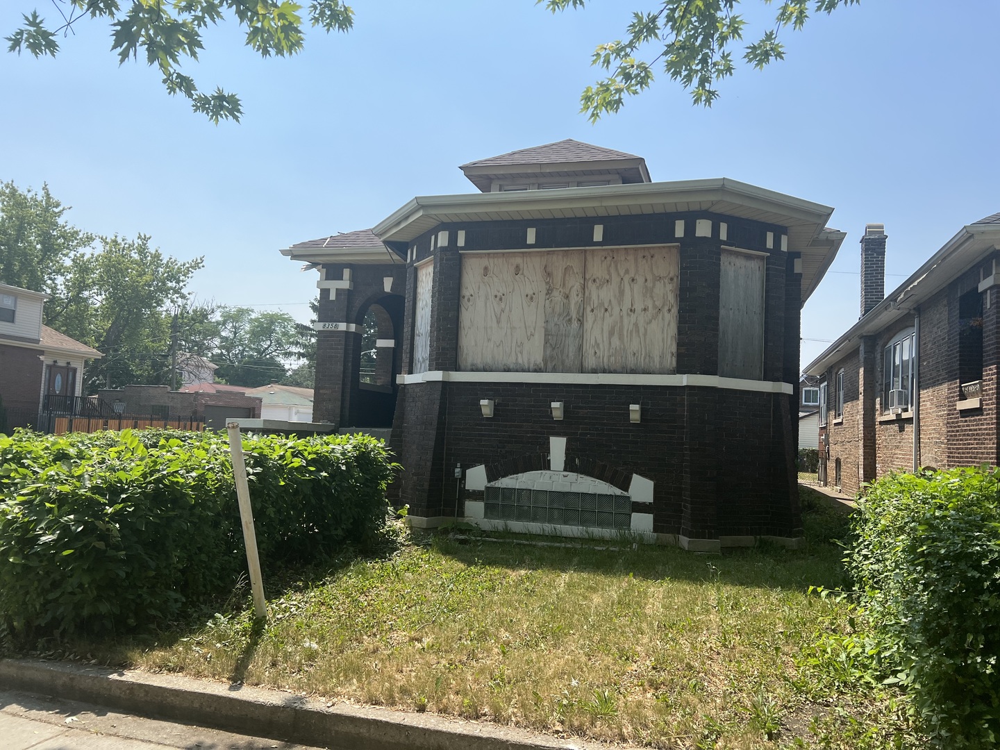 8358 South Ada Street Chicago, IL 60620 - Photo 1 of 1 a front view of a house with garden