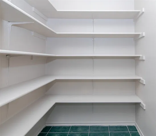 a bathroom with a sink toilet and a mirror