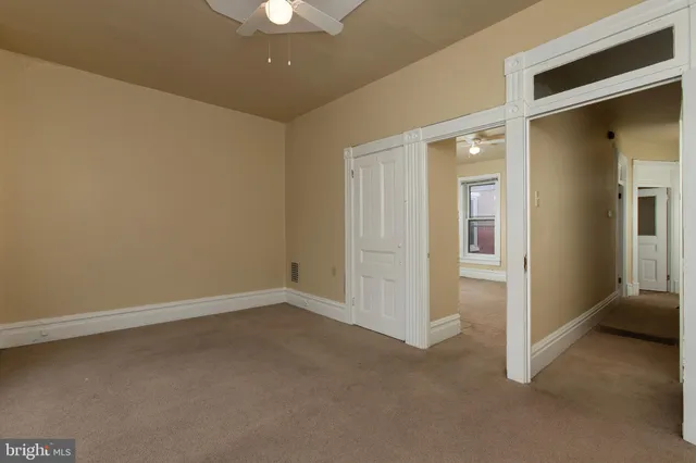 an empty room with closet