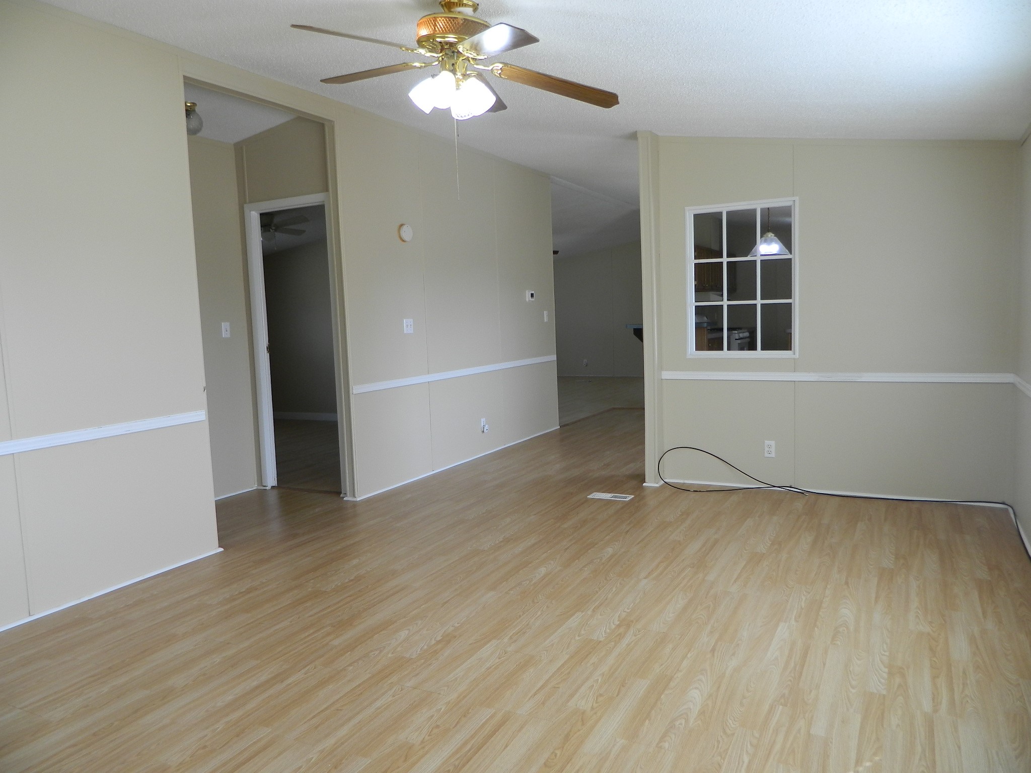 3434-2 Corrolla Magnolia, TX 77354 - Photo 12 of 40 wooden floor in an empty room with a window