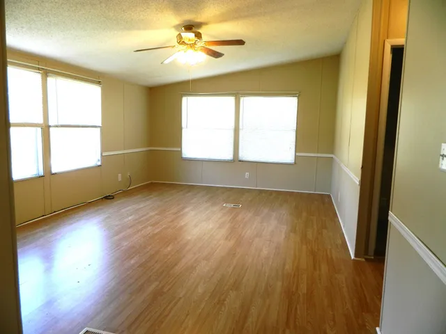 a view of a kitchen with a sink