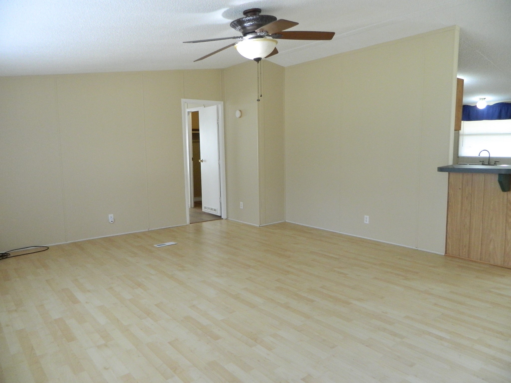 3434-2 Corrolla Magnolia, TX 77354 - Photo 17 of 40 a view of an empty room with a chandelier fan