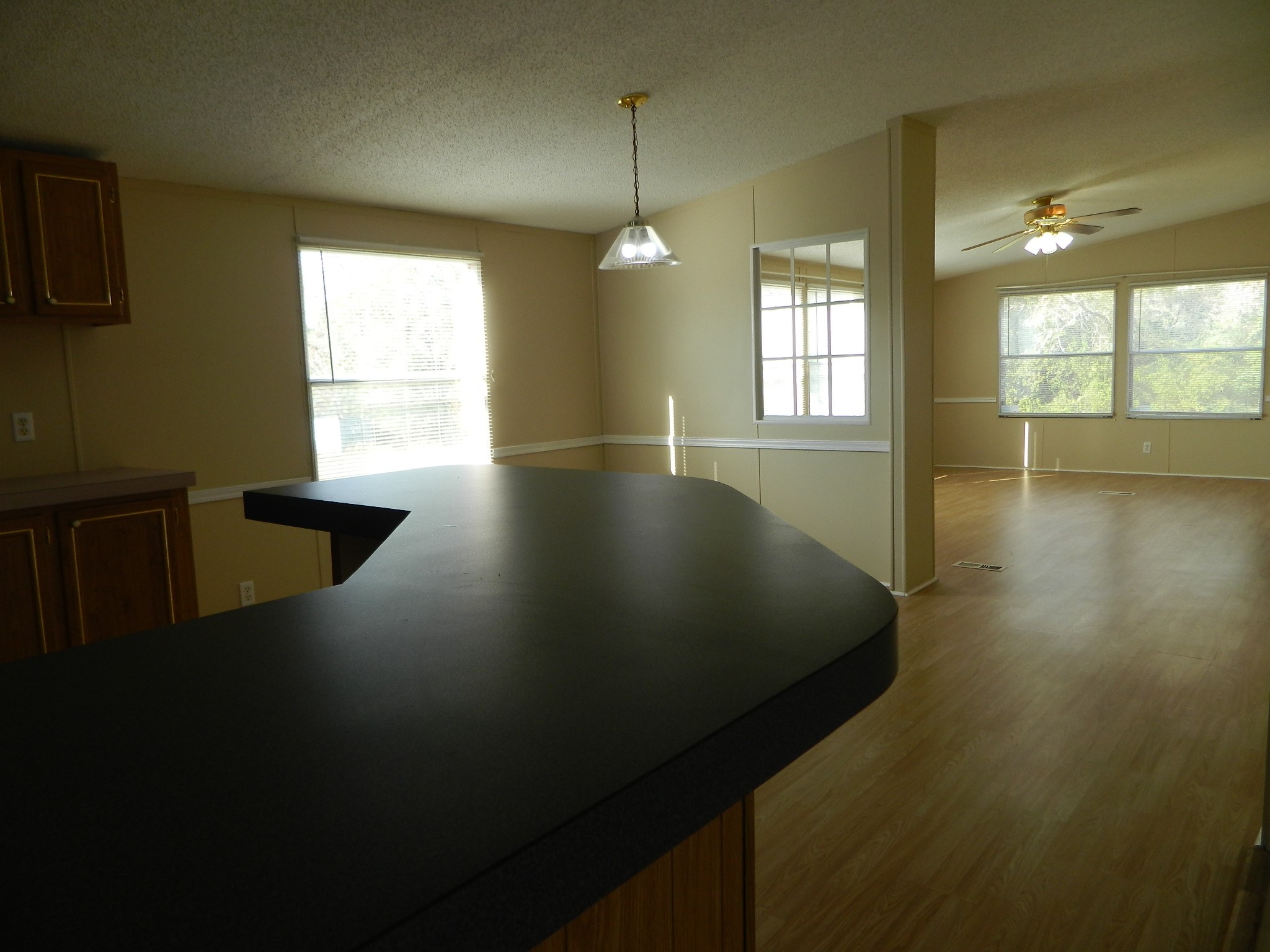 3434-2 Corrolla Magnolia, TX 77354 - Photo 18 of 40 a view of an empty room with wooden floor and a window