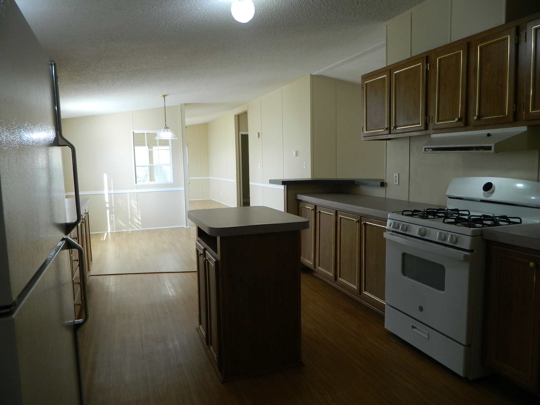 3434-2 Corrolla Magnolia, TX 77354 - Photo 20 of 40 a kitchen with a sink stove and cabinets