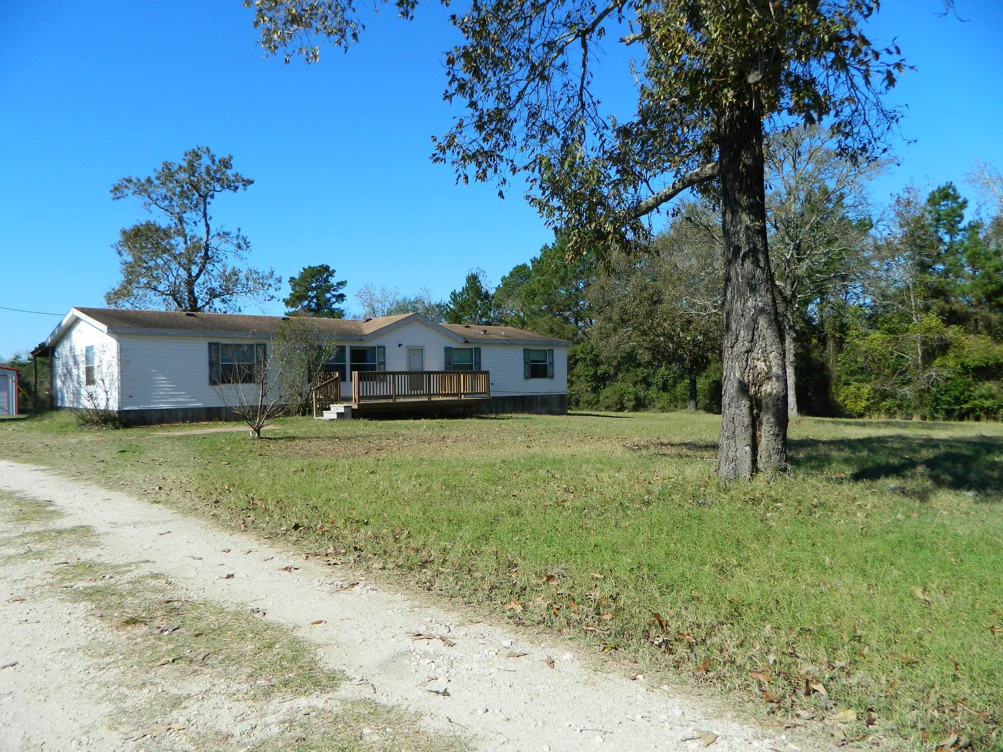 3434-2 Corrolla Magnolia, TX 77354 - Photo 36 of 40 a front view of a house with garden