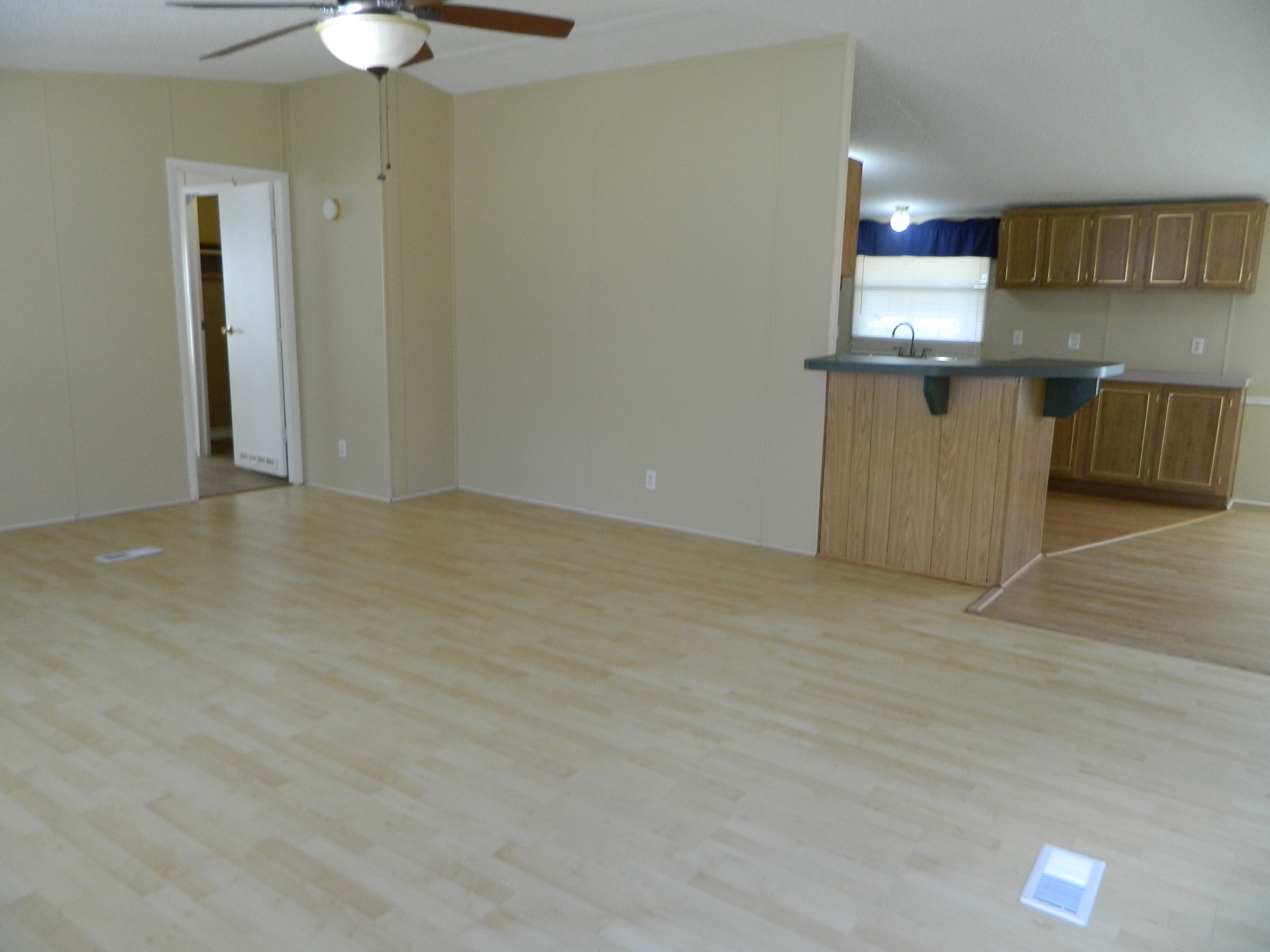 3434-2 Corrolla Magnolia, TX 77354 - Photo 4 of 40 an empty room with kitchen view and a chandelier