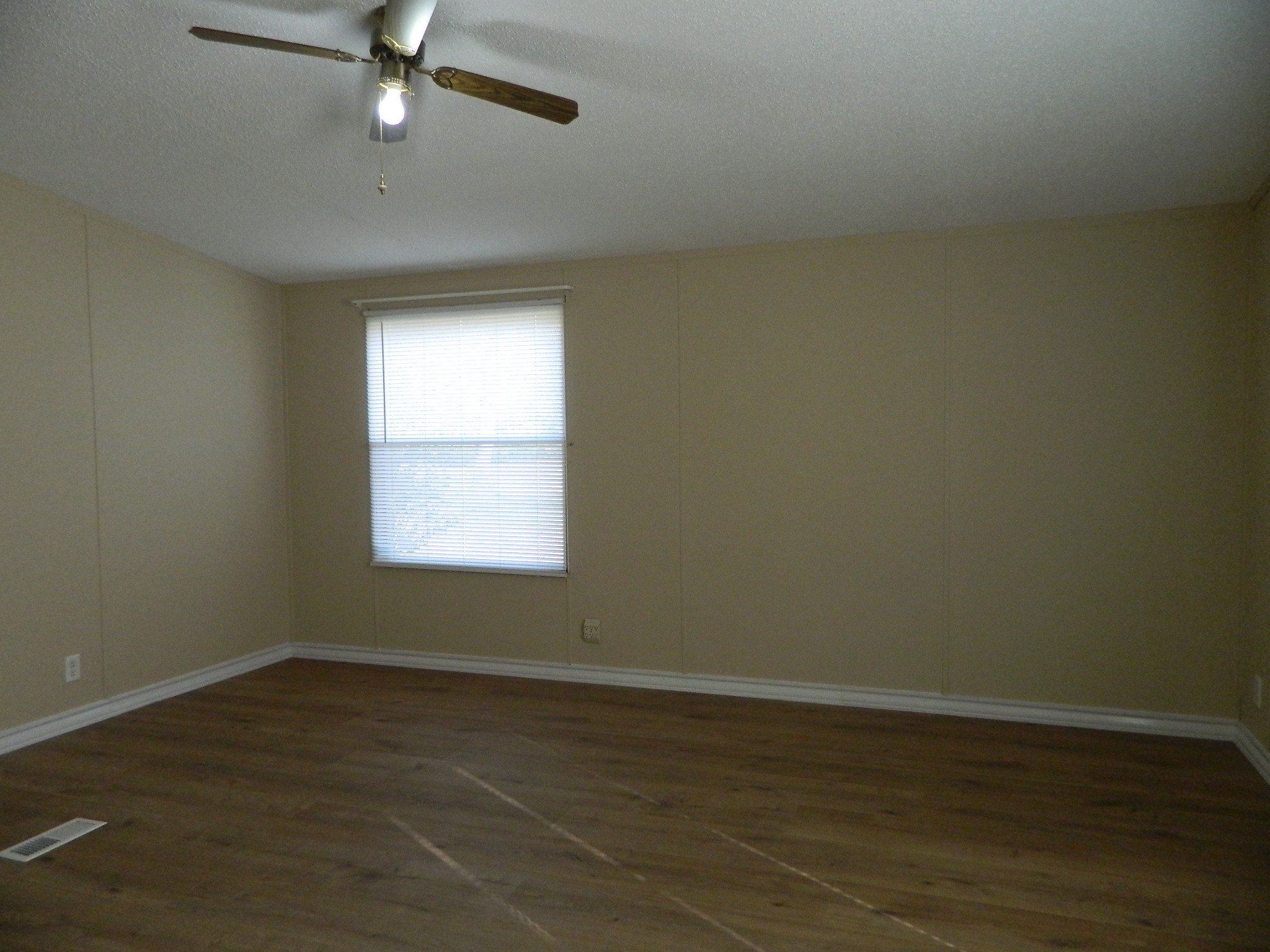 3434-2 Corrolla Magnolia, TX 77354 - Photo 6 of 40 an empty room with wooden floor fan and windows