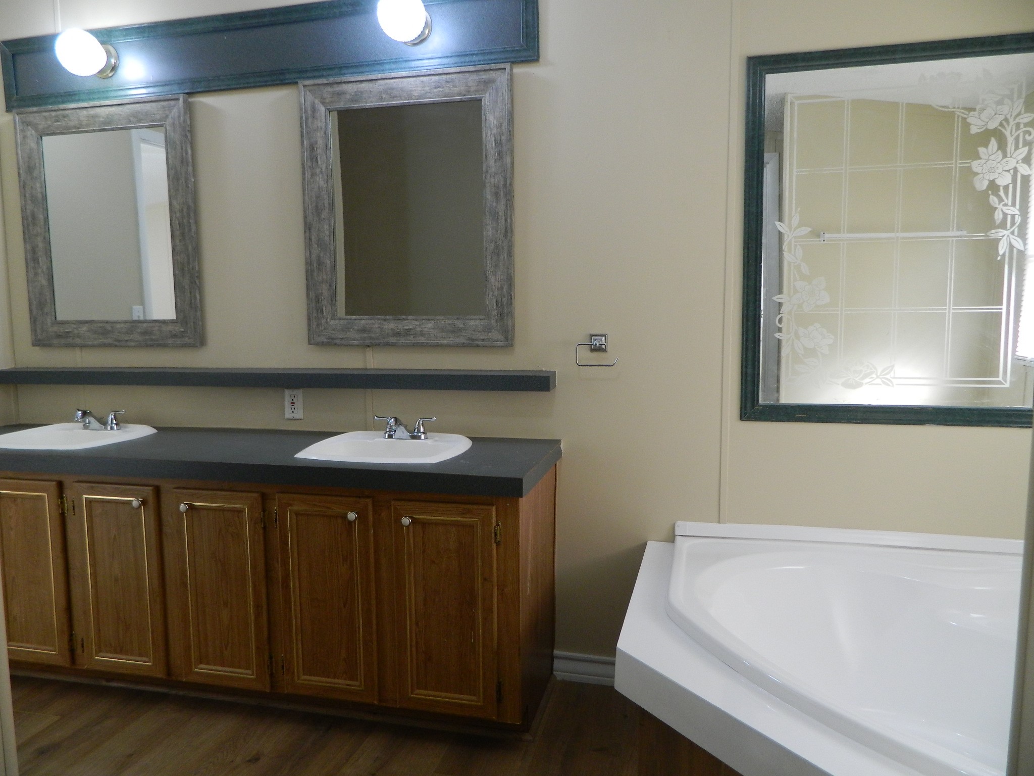 3434-2 Corrolla Magnolia, TX 77354 - Photo 8 of 40 a bathroom with a sink and a mirror