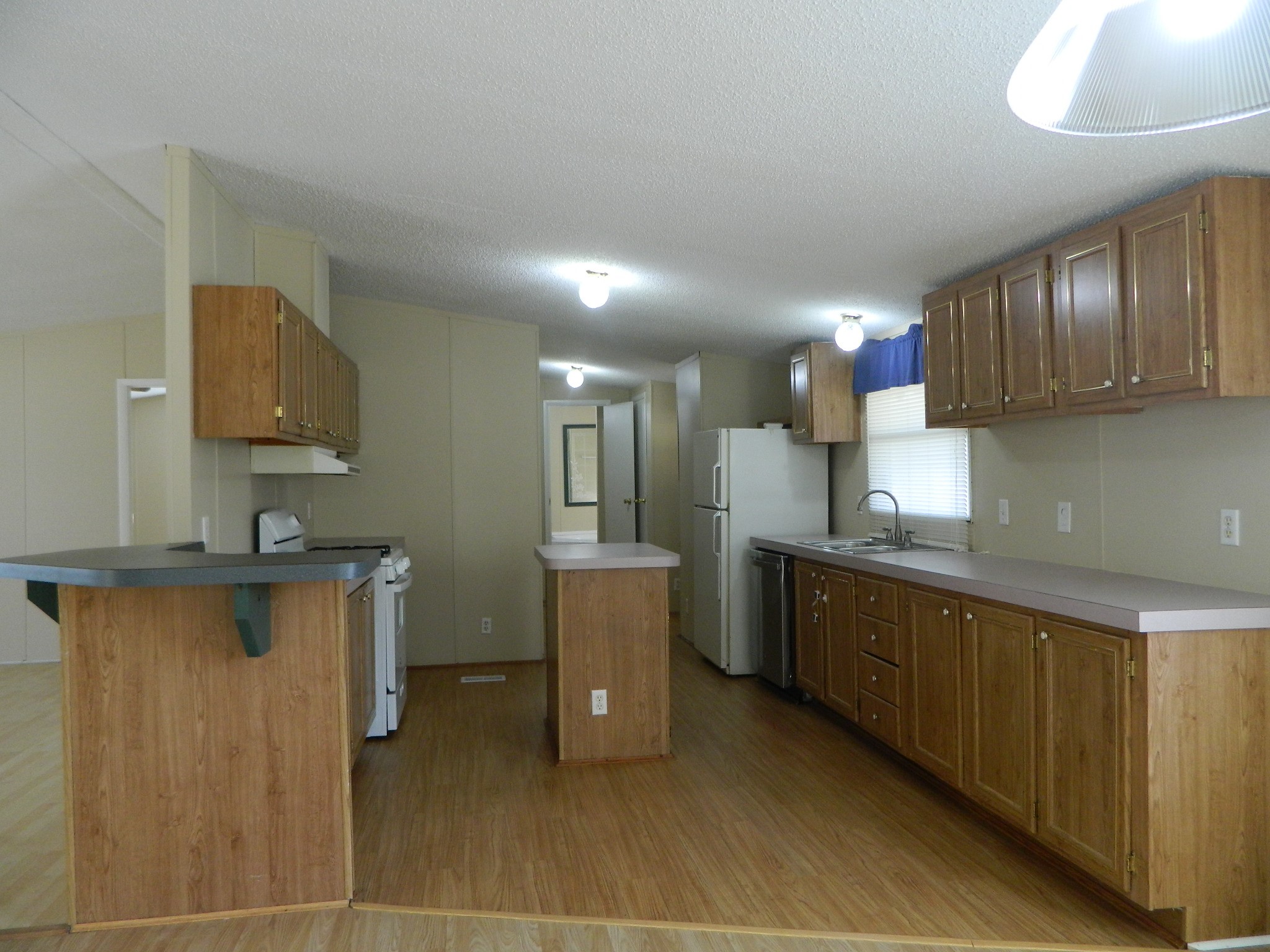 3434-2 Corrolla Magnolia, TX 77354 - Photo 10 of 40 a kitchen with a sink cabinets and window