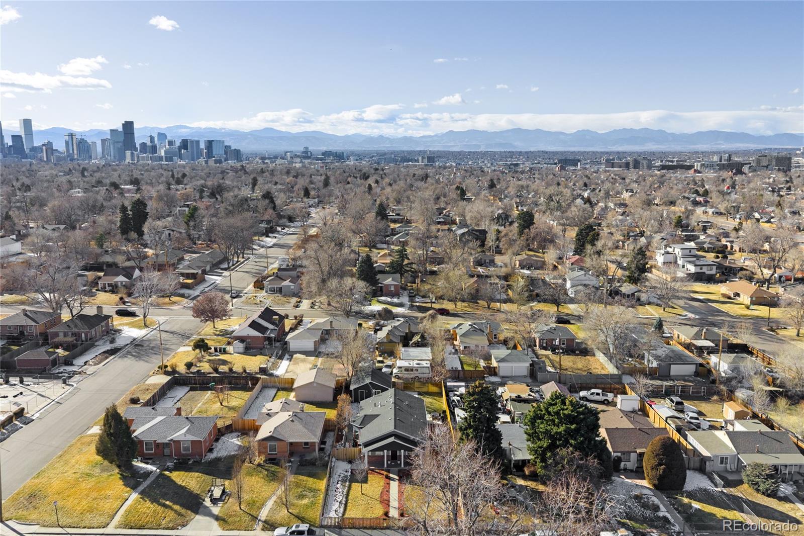 3017 Steele Street Denver, CO 80205 - Photo 25 of 36 an aerial view of multiple house