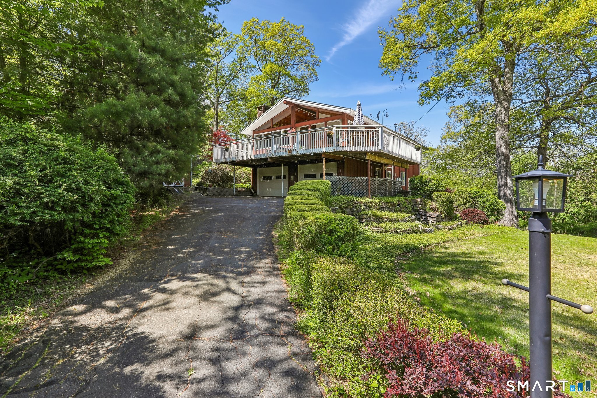 4 Alan Road Danbury, CT 06810 - Photo 1 of 38 a house with a tree in front of it